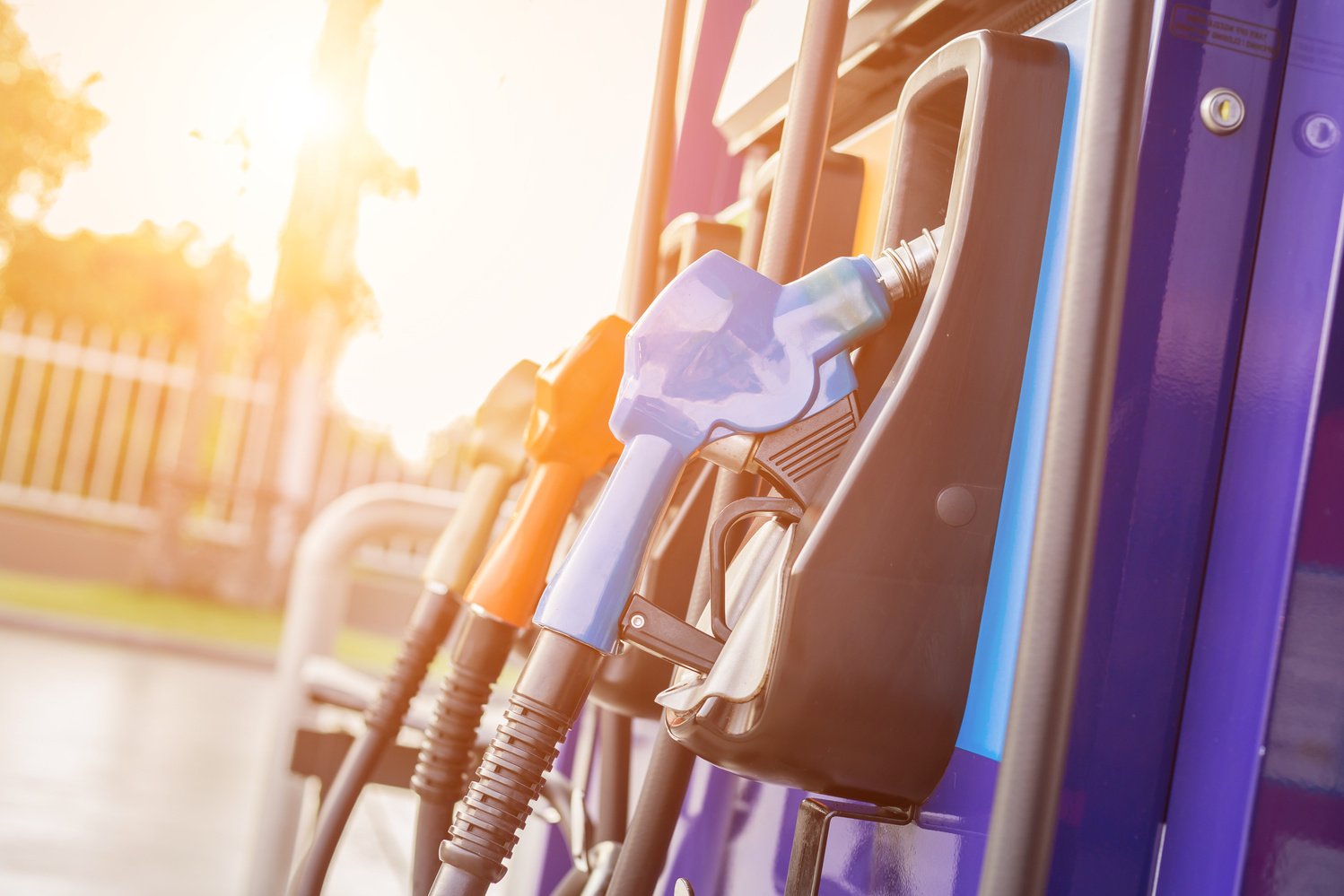 Colorful fuel pumps/Fuel nozzle at gas station